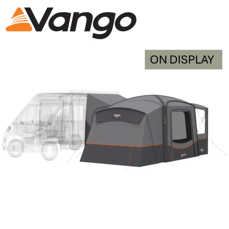 Vango Versos Air Mid Driveaway Awning set up beside a campervan, showcasing spacious design and airy fabric structure.