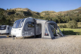 Vango Palma Poled 330 Awning displayed in a campsite setting, showcasing spacious design and sturdy poles.