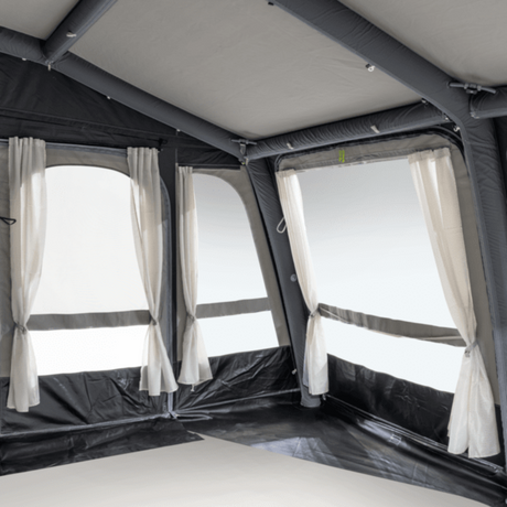 Dometic Grande Air All Season 390 Awning set up, showcasing its spacious design and durable fabric for outdoor use.