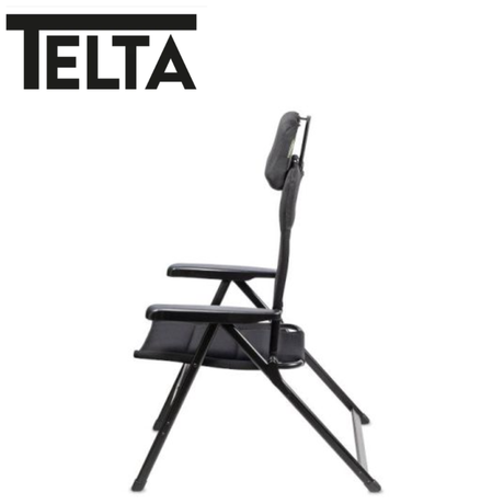 Telta Anholt reclining chair with plush cushioning and wooden armrests, shown in a relaxed seated position.