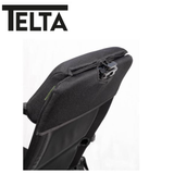 Telta Anholt reclining chair with plush fabric upholstery and a sleek design, perfect for relaxing in a modern living space.
