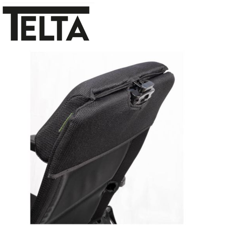 Telta Anholt reclining chair with plush fabric upholstery and a sleek design, perfect for relaxing in a modern living space.