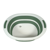 Pack and Go Collapsible Sink with Cutting Board shown folded with the sink and cutting board visible in a compact, portable design.