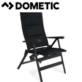 Dometic Cortina Black reclining chair with padded armrests and ergonomic design, ideal for relaxation and outdoor use.