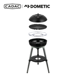 Cadac Dometic Carri Chef 40 gas BBQ with detachable dome, showcasing a portable cooking design in outdoor setting.