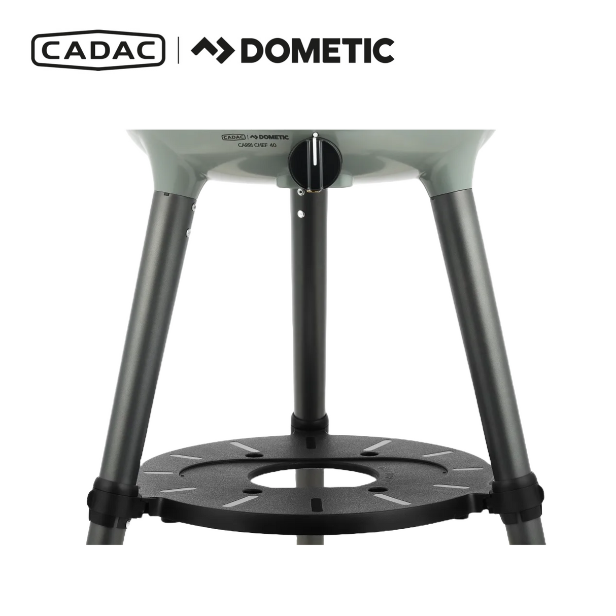 Cadac Dometic Carri Chef 40 gas BBQ with dome, showcasing compact design and cooking surface in outdoor setting.