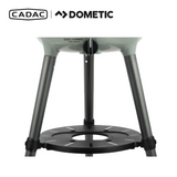 Cadac Dometic Carri Chef 40 gas BBQ with dome, showcasing compact design and cooking surface in outdoor setting.
