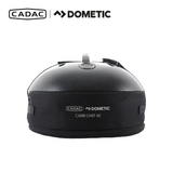 Cadac Dometic Carri Chef 40 gas BBQ with detachable dome and cooking surface on a portable grill setup.