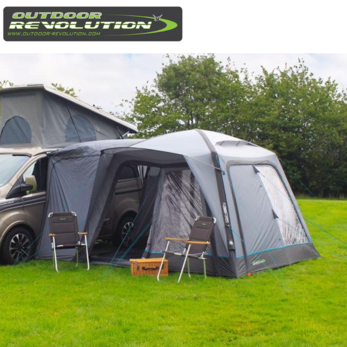 Outdoor Revolution Cayman Air High Driveaway awning set up outdoors, showing its spacious design and durable fabric for camping adventures.