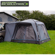 Outdoor Revolution Cayman Air High Driveaway Awning set up on a campsite with spacious fabric and air beam structure for outdoor camping.