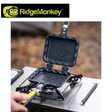 RidgeMonkey Crimpanzee Toaster Pan with non-stick surface and ridged design, ideal for toasting and grilling in the kitchen.