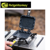 RidgeMonkey Crimpanzee Toaster Pan with non-stick surface and ridged design, ideal for toasting and grilling in the kitchen.