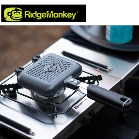RidgeMonkey Crimpanzee Toaster Pan with non-stick surface, designed for easy toasting and cooking in a compact, versatile camping pan.