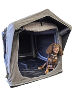 Dometic K9 80 Air awning showcasing its sleek design and durable fabric in a natural outdoor setting.