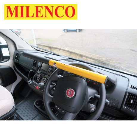 Milenco Commercial High Security Steering Wheel Lock secured on a steering wheel, showcasing its robust design and security features.