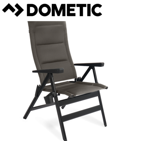 Dometic Cortina reclining chair in shale fabric, featuring a comfortable padded seat and armrests for relaxing seating.
