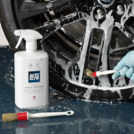 Autoglym Custom Wheel Cleaner Complete Kit with spray bottle and brush for effective vehicle wheel cleaning.
