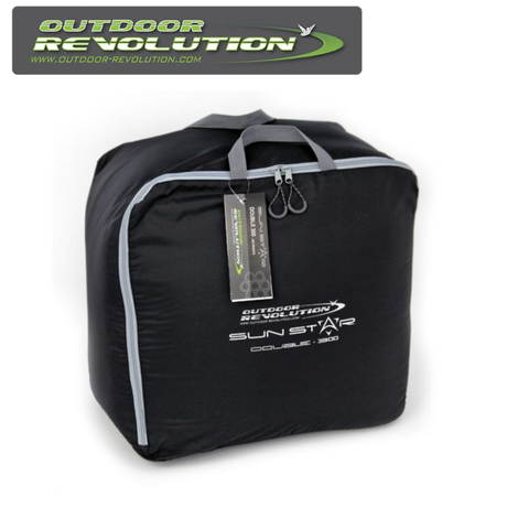 Outdoor Revolution SunStar Double 300 sleeping bag in vibrant colors, laid out on grass with zippers and plush fabric visible.