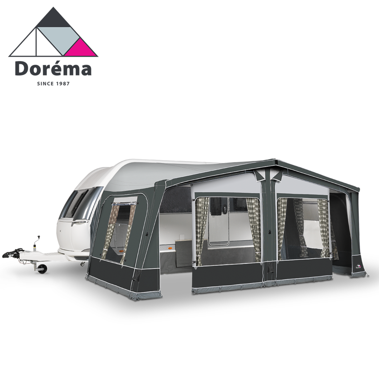 Dorema Air Seasonal Caravan Awning set up, showcasing its spacious design and air-filled structure in a scenic outdoor setting.