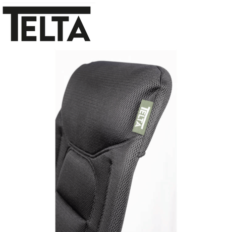 Telta Falster reclining chair with cushioned armrests and ergonomic design, shown in a cozy living room setting.