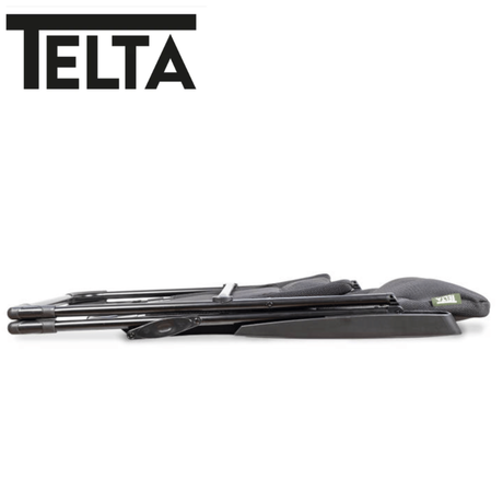 Telta Falster reclining chair with plush fabric upholstery and a modern design, shown in a comfortable, reclined position.