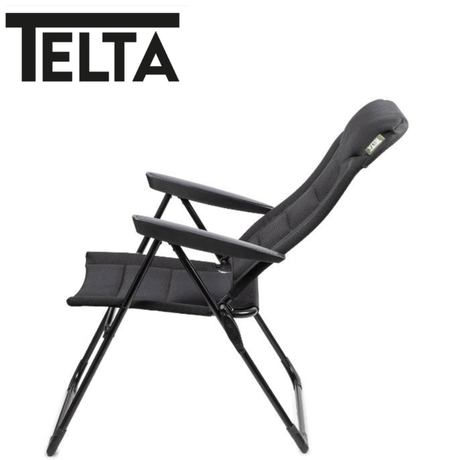 Telta Falster reclining chair with padded armrests and plush fabric upholstery, shown in a relaxed, semi-reclined position.