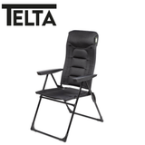 Telta Falster reclining chair with plush upholstery and adjustable backrest, designed for comfort and relaxation.