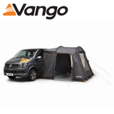 Vango Faros III Poled Driveaway Awning set up outside a campervan, showcasing its spacious design and sturdy poles.