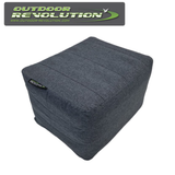 Outdoor Revolution Campese Inflatable Footrest in a cozy outdoor setting, showcasing its ergonomic design and durability.