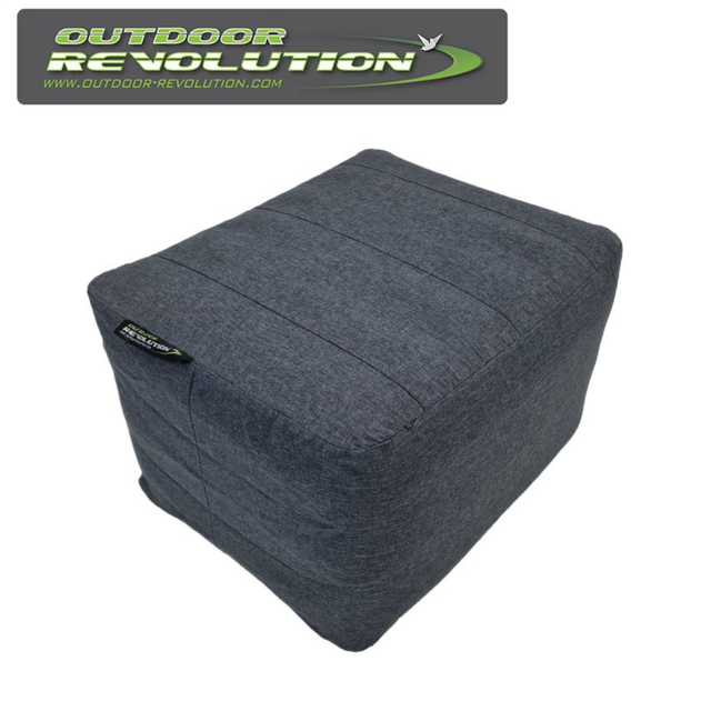Outdoor Revolution Campese Inflatable Footrest in a cozy outdoor setting, showcasing its ergonomic design and durability.