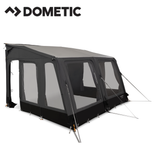 Dometic Grande AIR Stay 390 S porch awning set up on a camper, showcasing its large fabric canopy and sturdy support arms.