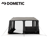 Dometic Grande AIR Stay 390 S porch awning with fabric and air tube structure, providing shade and shelter for outdoor camping.