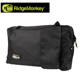RidgeMonkey Grilla BBQ Dual Fuel grill with black cooking surface and control knobs, suitable for outdoor grilling and barbecues.