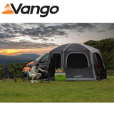 Vango Hexaway Pro Air Low Driveaway Awning set up beside a campervan, showcasing its spacious design and air beams.