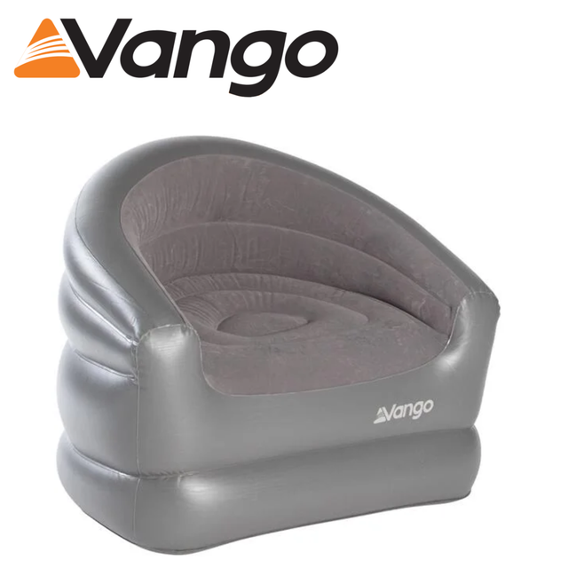 Vango Inflatable Chair in a cozy living room setting, showcasing its comfortable design and vibrant color.