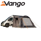 Vango Kela Pro Air Mid Driveaway Awning set up beside a campervan, showcasing spacious design and durable fabric.