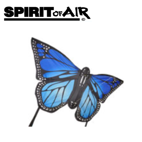 Large Spirit of Air Monarch Butterfly kite with light blue and white design flying against a clear sky.