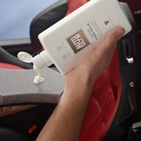 Autoglym Leather Care balm in a jar, showcasing its creamy texture for vehicle leather cleaning and conditioning.