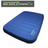 Outdoor Revolution Skyfall Double 200 self-inflating sleeping mat on a grassy surface, showcasing its thick, cushioned design.