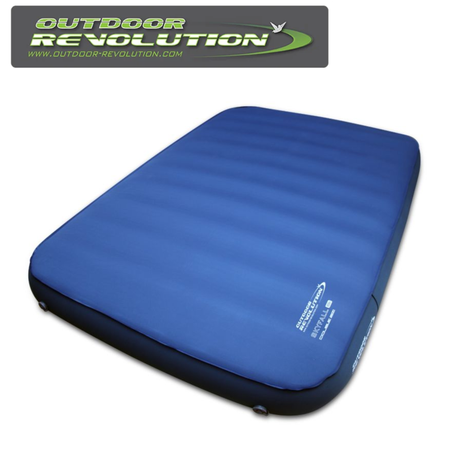 Outdoor Revolution Skyfall Double 200 self-inflating sleeping mat on a grassy surface, showcasing its thick, cushioned design.