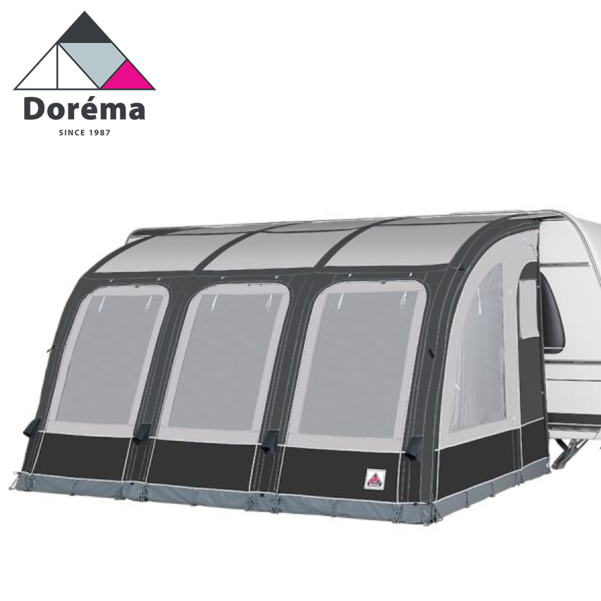 Dorema Magnum Air Force 390 all season air awning set up with spacious interior and robust design against a scenic backdrop.