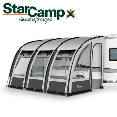 Dorema StarCamp Magnum 390 touring awning set up, showcasing its spacious design and durable fabric in an outdoor setting.