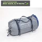 Outdoor Revolution Skyfall Double 150 self-inflating sleeping mat in a compact, rolled-up position on a grassy surface.