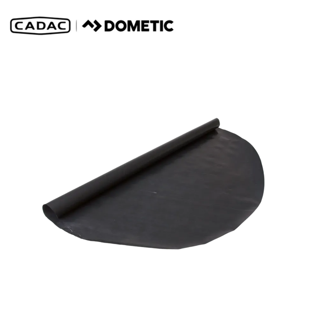 Cadac Dometic BBQ grill mats laid out on a surface, designed to protect and make grilling easier.