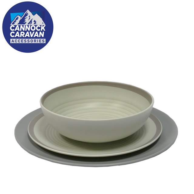 Grey 16-piece dinner set by Nature Haven, featuring elegant melamine plates and bowls arranged on a rustic table.