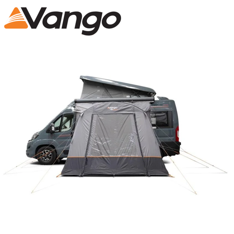 Vango Faros III Air Mid Driveaway Awning with spacious interior and inflatable structure set up beside a campervan.