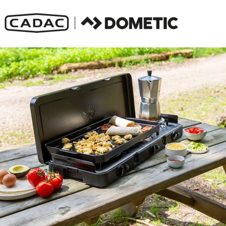 Cadac Dometic 2 Cook Plancha Plate for outdoor grilling, featuring a flat cooking surface and stainless steel construction.