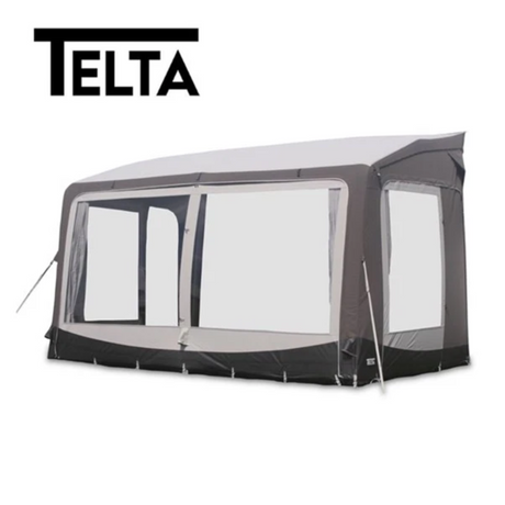 Telta Pure 390 Porch Awning, a spacious air awning with a sleek design, set up beside a caravan in a scenic outdoor setting.