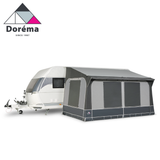 Dorema Quartz 400 Deluxe Porch Awning in a spacious outdoor setting, showcasing its durable fabric and frame design.