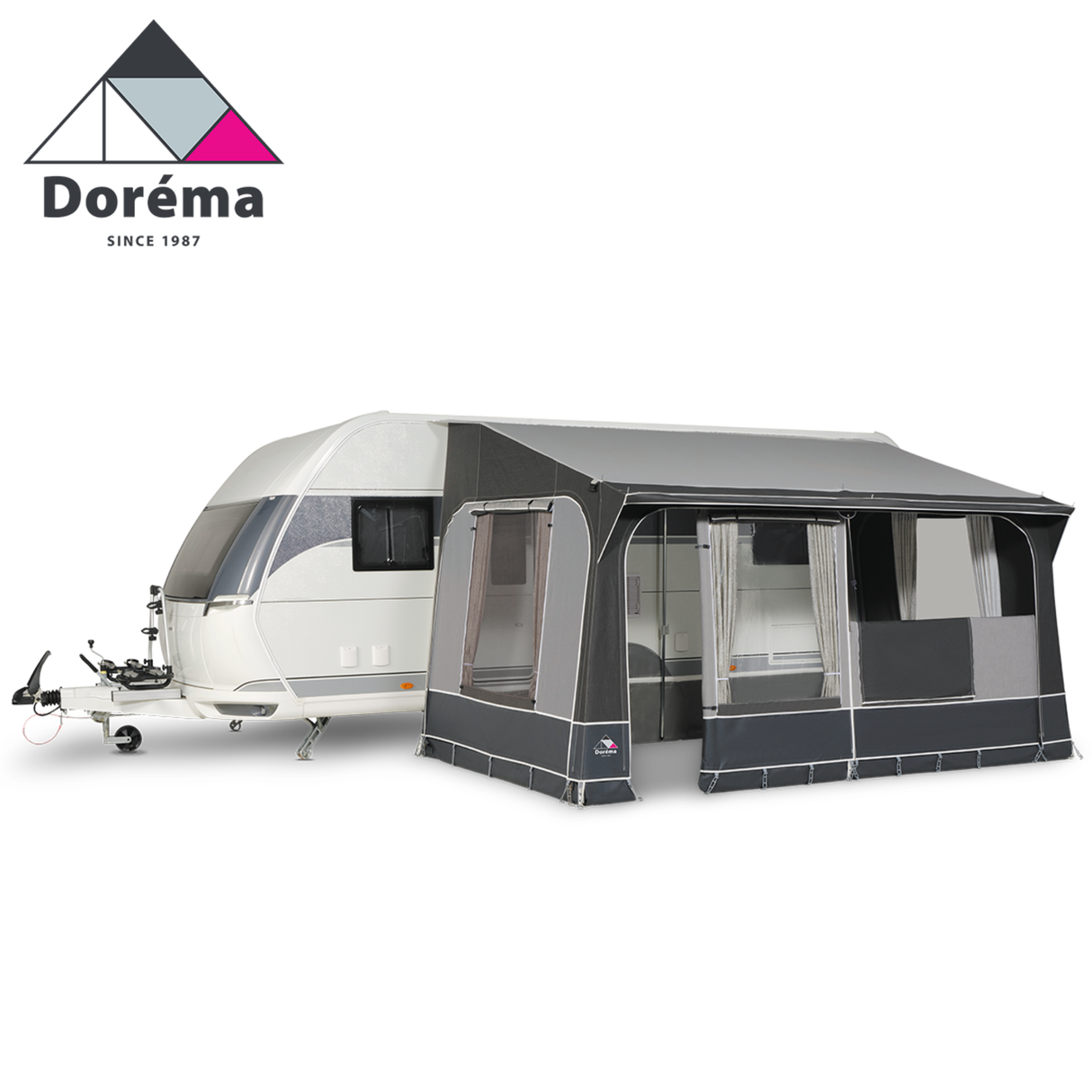 Dorema Quartz 400 Deluxe porch awning, featuring a spacious design and durable fabric, set up outside a camper.